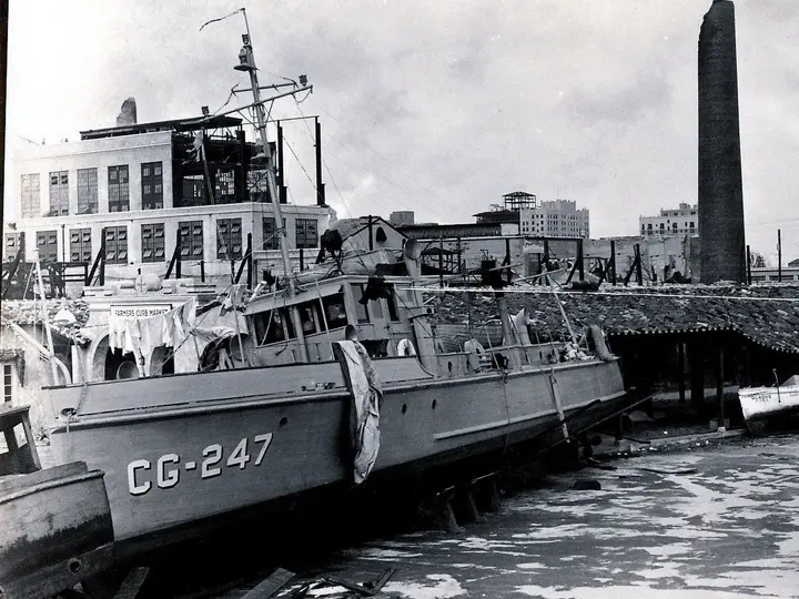 Coast Guard vessel CG-247 amid Miami hurricane wreckage